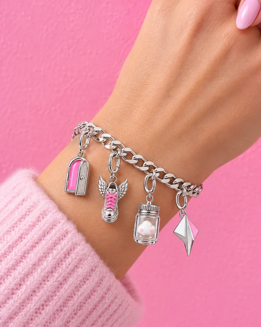 Four charms on the Curb Chain Bracelet