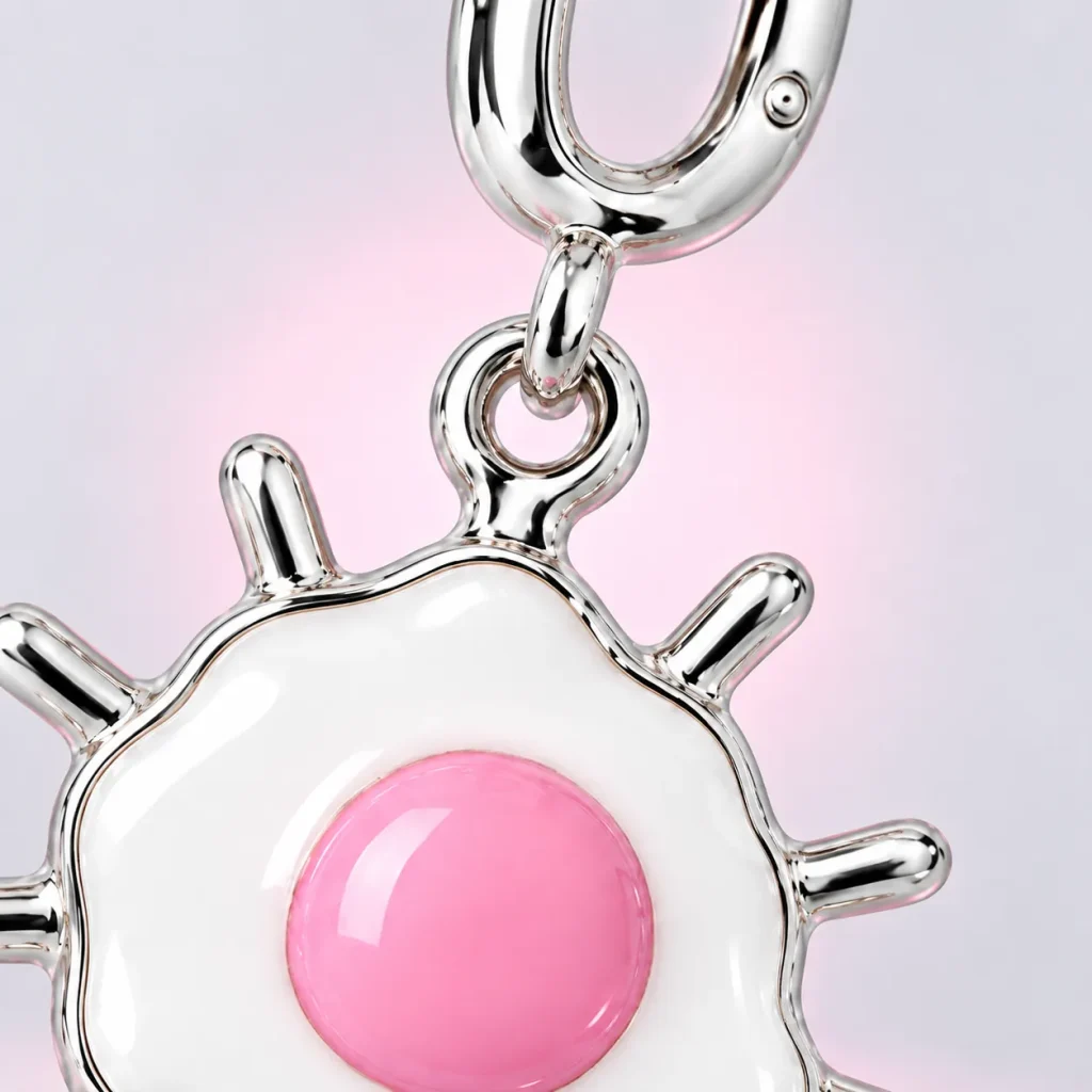 Sunny Egg Charm, close-up of the enamel and clasp