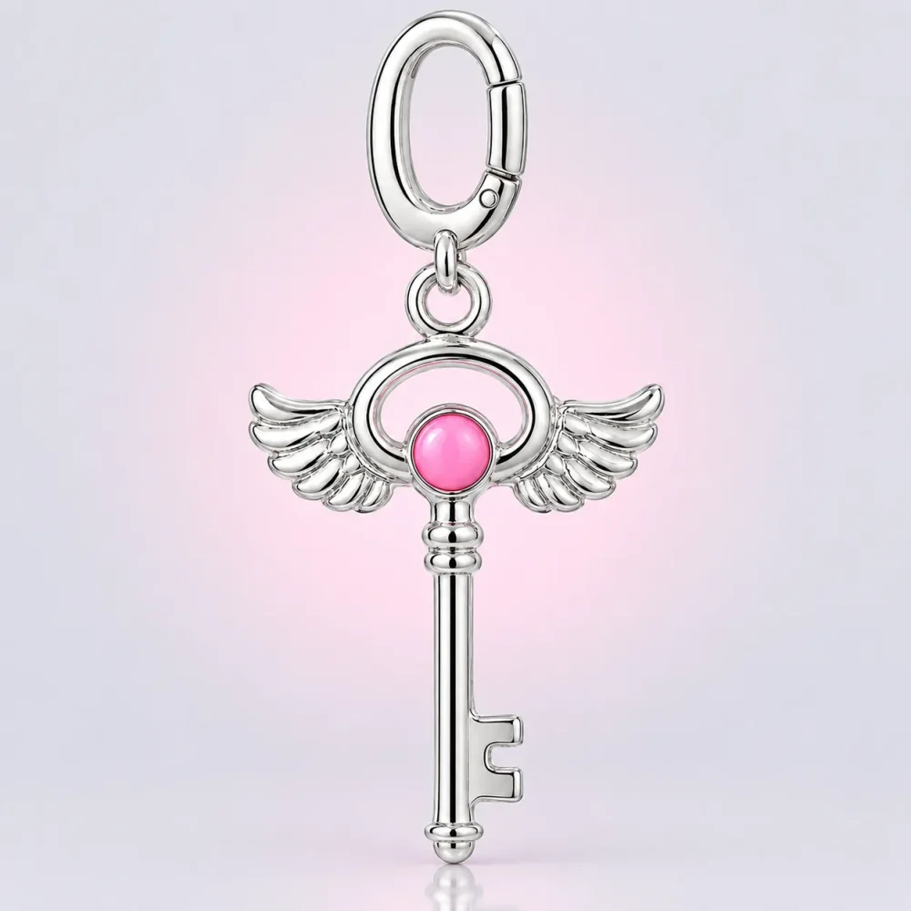 Winged Key Charm, front view
