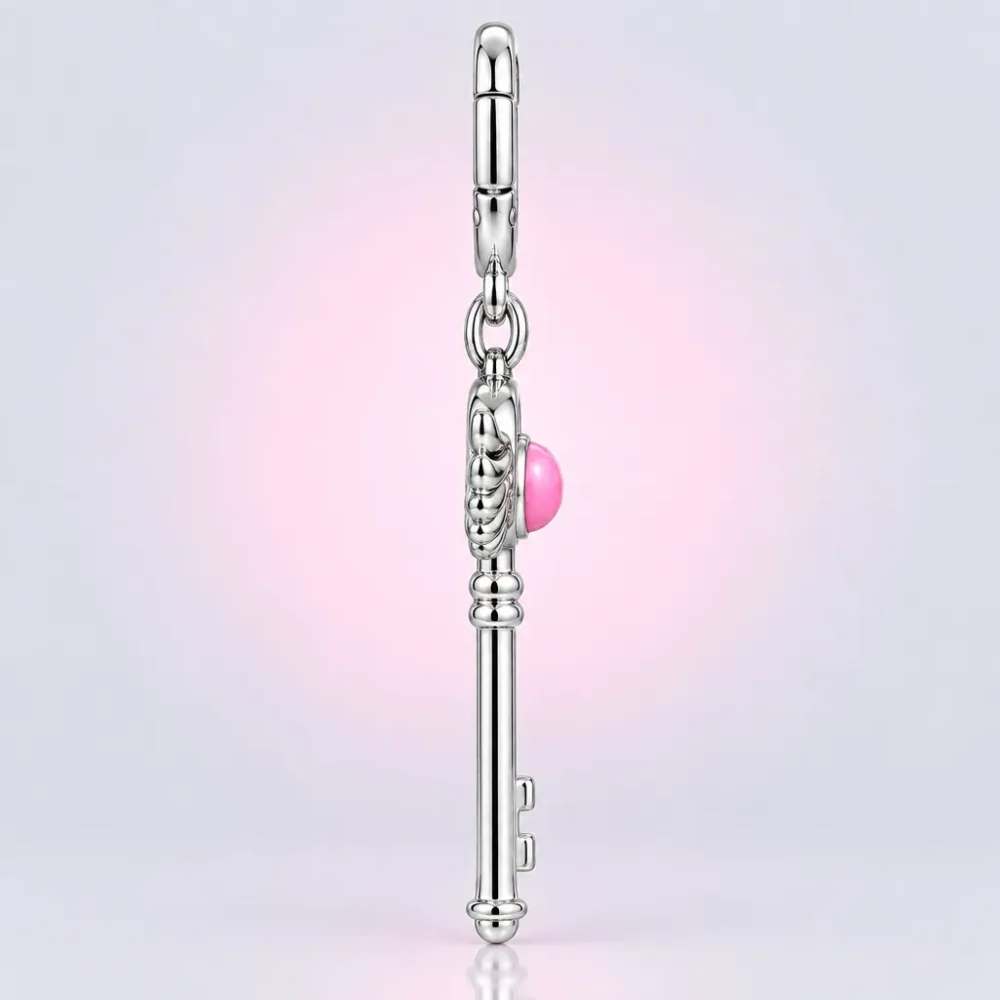 Winged Key Charm, side view