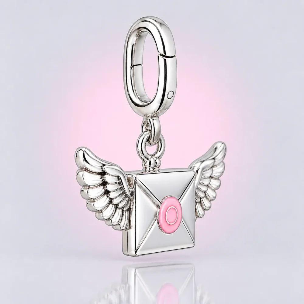 Winged Letter Charm, three-quarter view