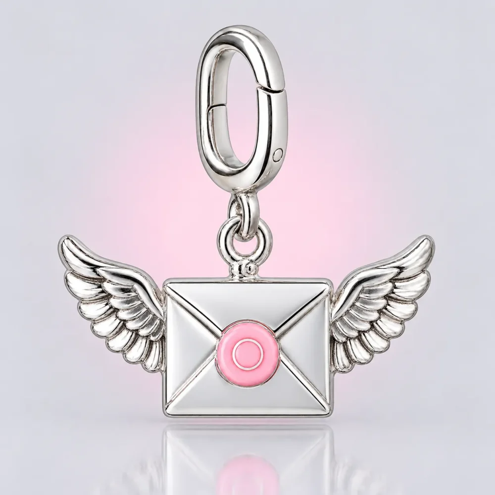 Winged Letter Charm, front view