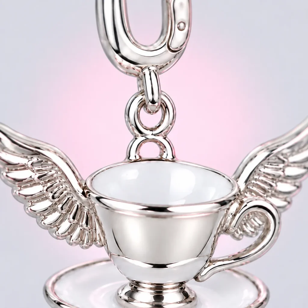 Winged Teacup Charm, close-up of the enamel and clasp
